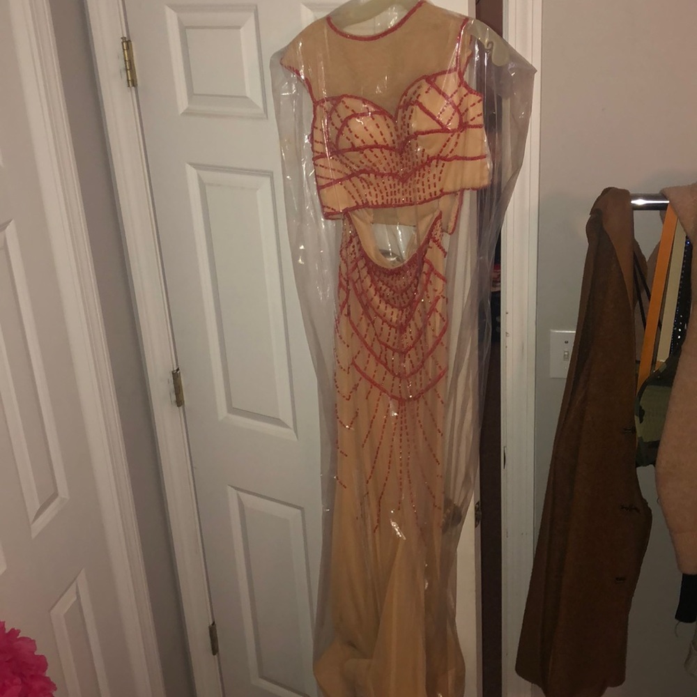 Tan and red beaded prom dress
